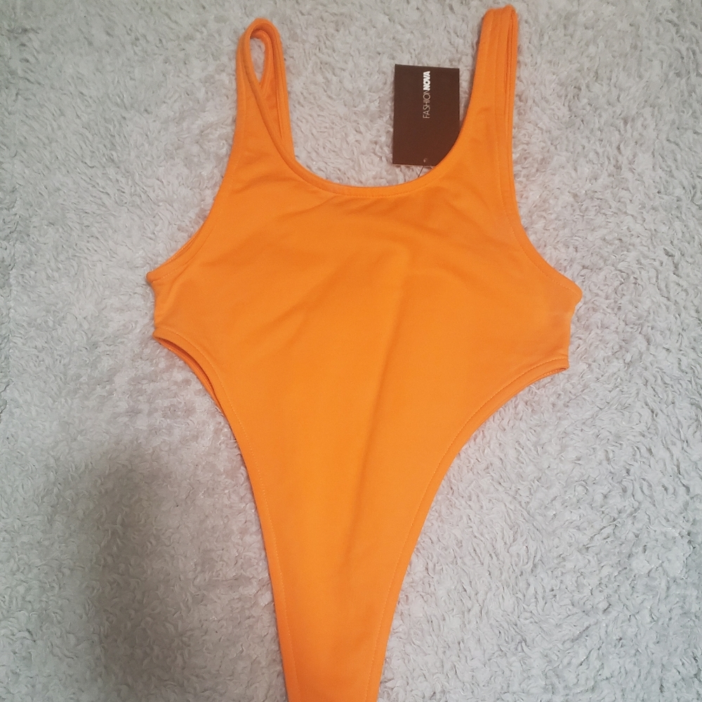 Neon orange body suit